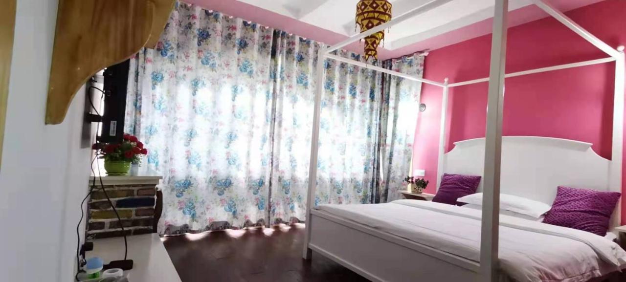 Zhangjiajie April Hostel Екстер'єр фото