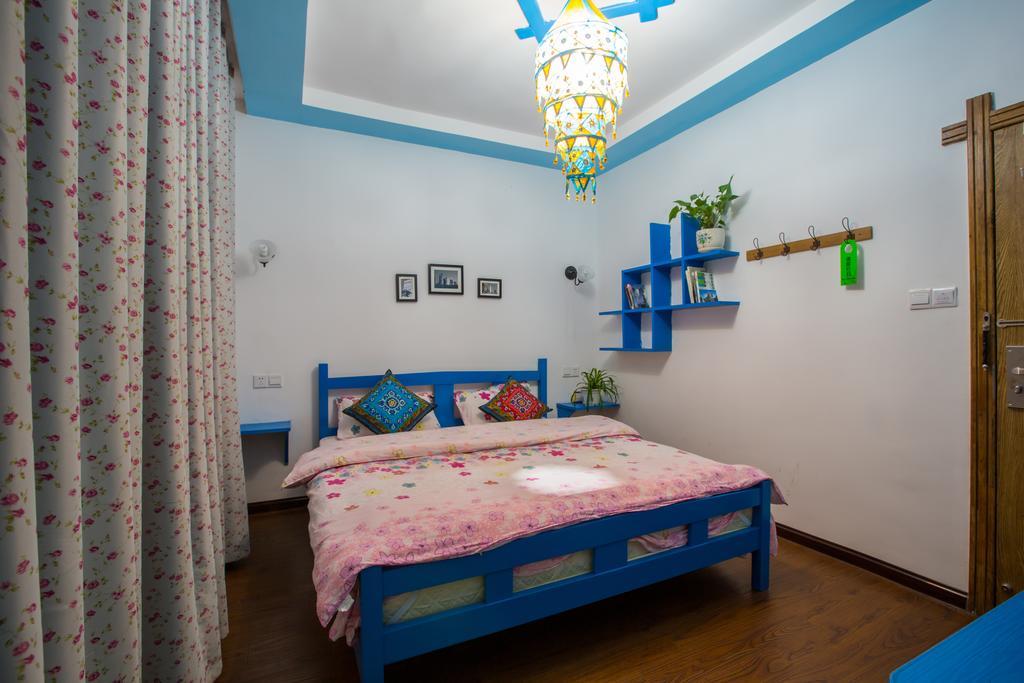 Zhangjiajie April Hostel Номер фото