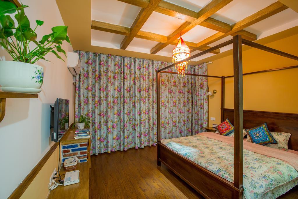 Zhangjiajie April Hostel Номер фото