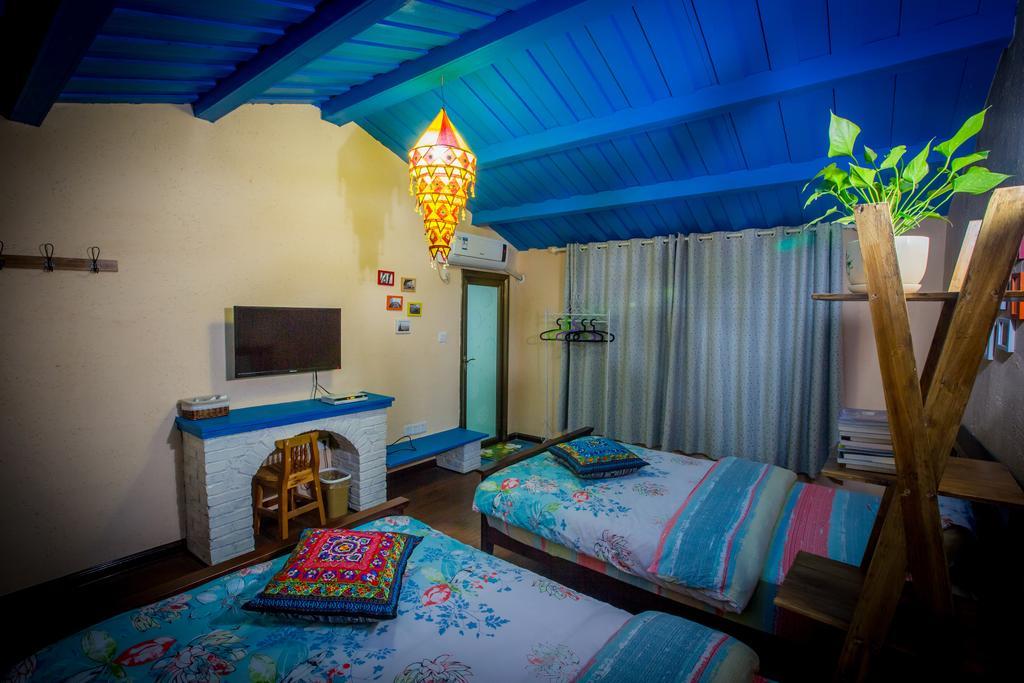 Zhangjiajie April Hostel Номер фото