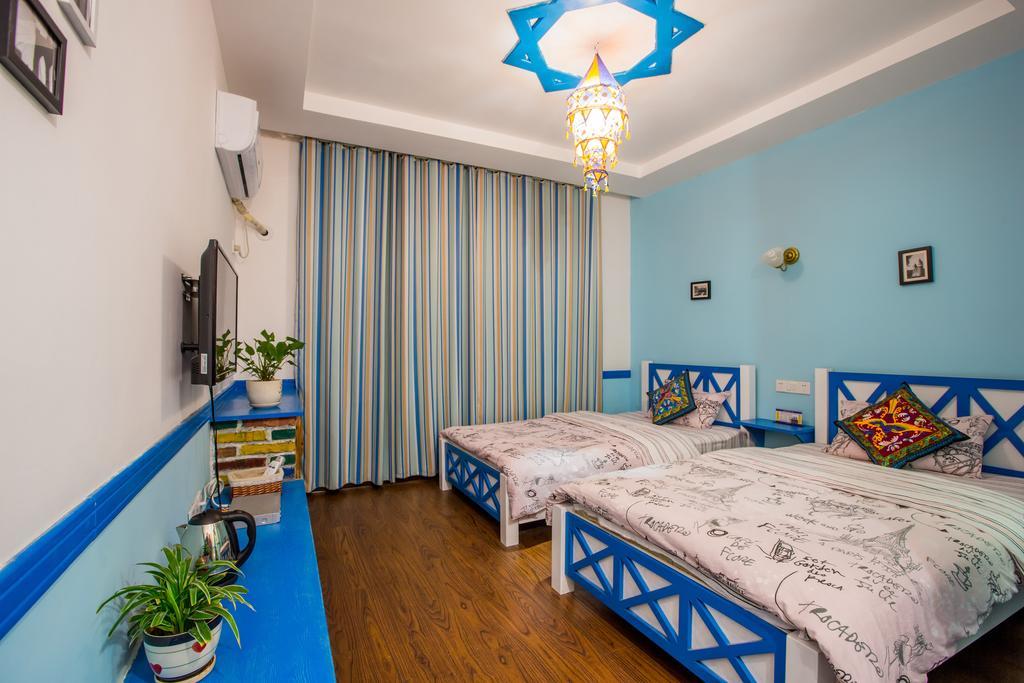 Zhangjiajie April Hostel Номер фото